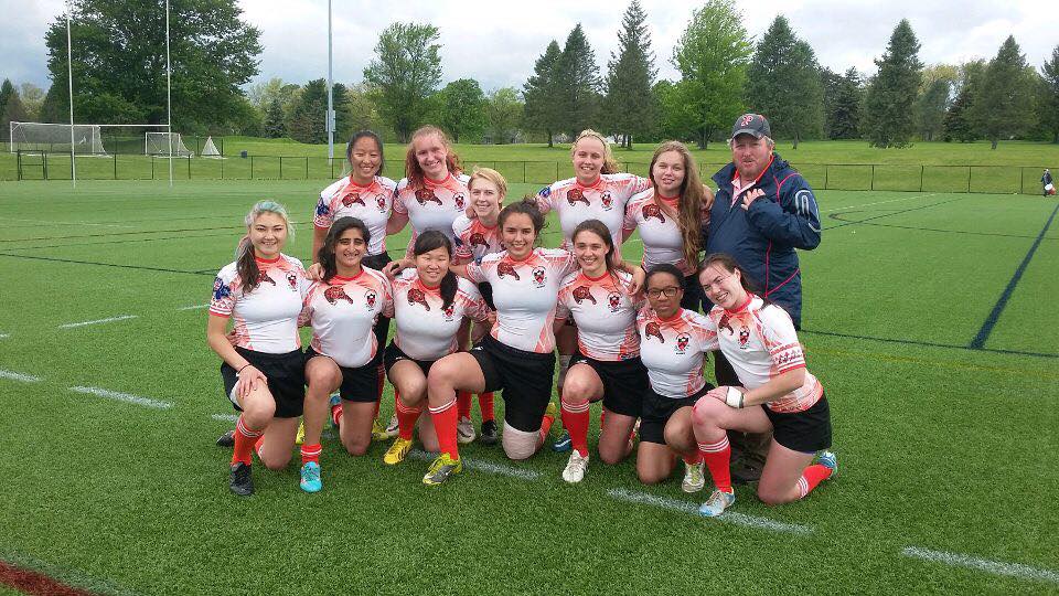 The Princeton women with coach Chris Ryan after the Penn State 7s
