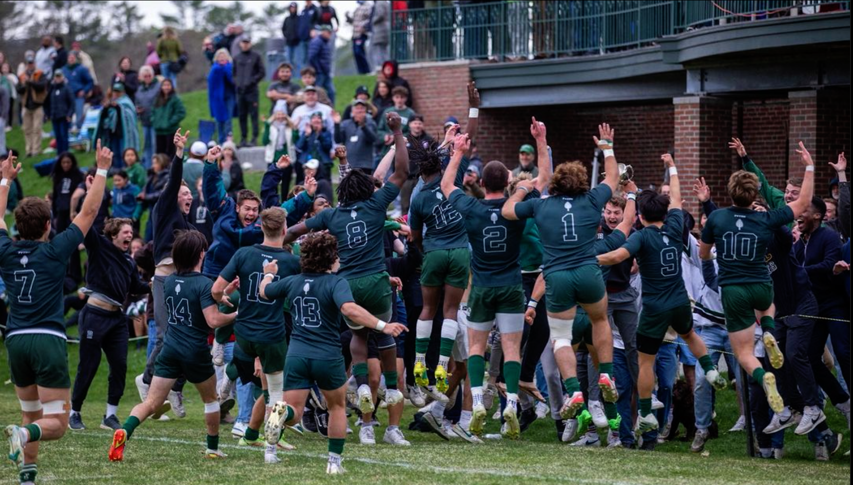 players and fans celebrate at Brophy