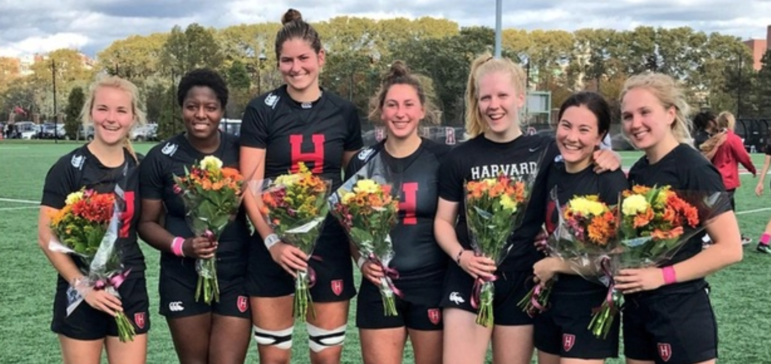 Harvard seniors celebrate after home win