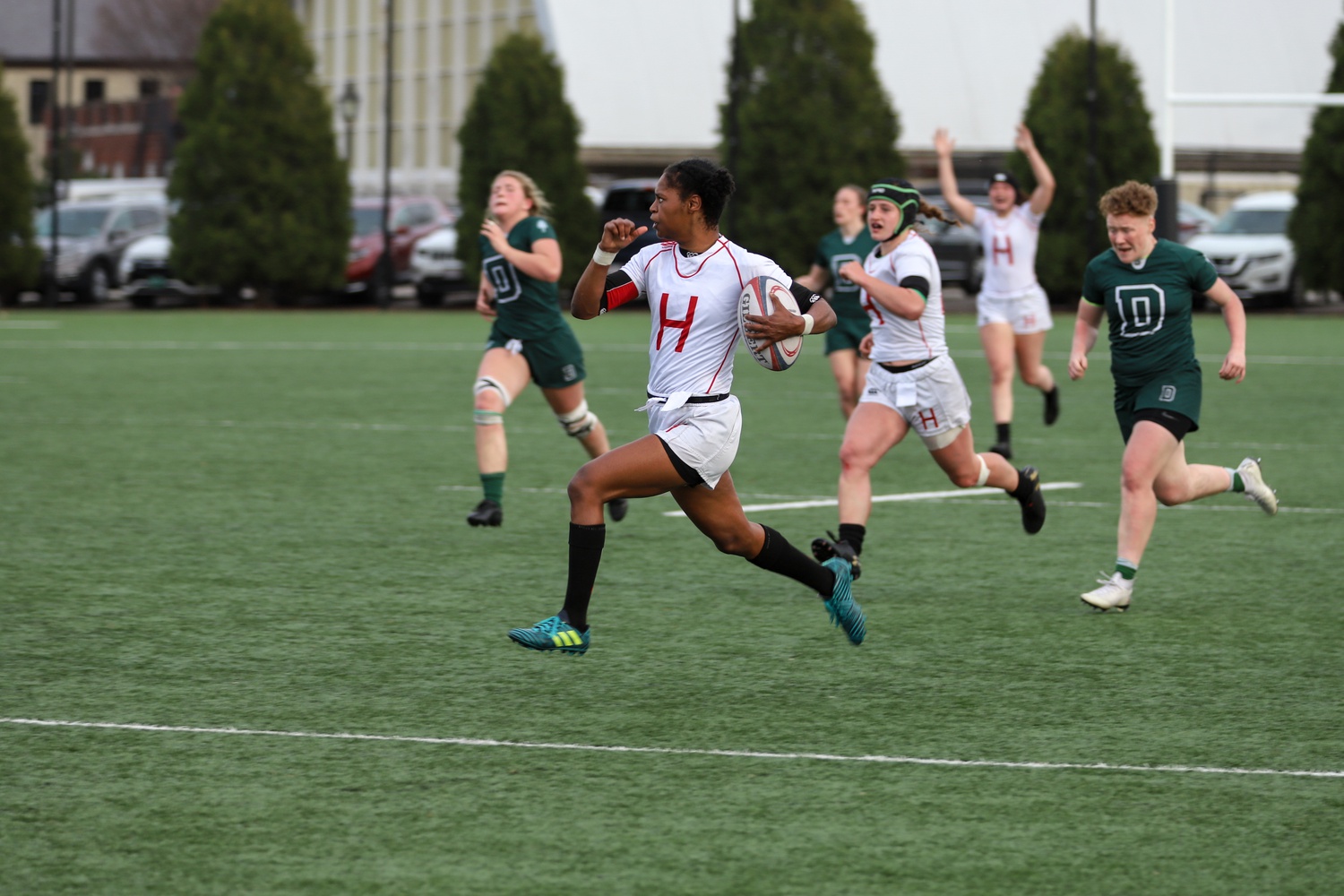 Junior wing Dominique Cantave breaks away from the Dartmouth defense on her way to the game winning try.