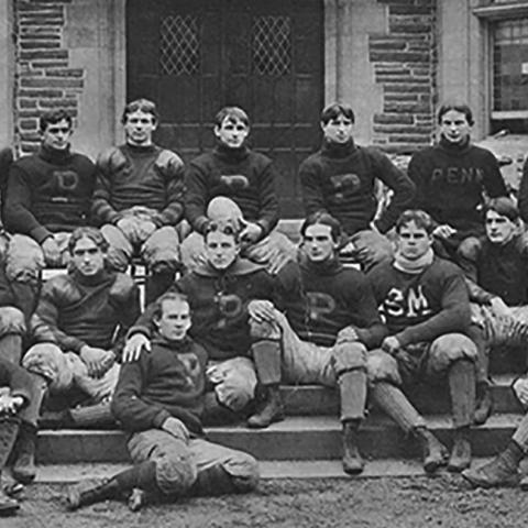 the undefeated Penn Rugby Football team was photographed in front of Houston Hall