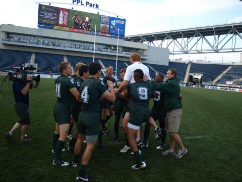 Dartmouth players celebrate with coach Alex Magleby on National TV
