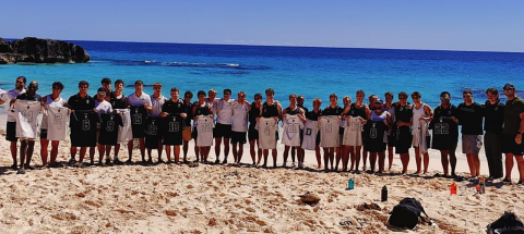 players line up on the sand