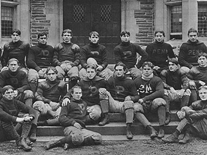 the undefeated Penn Rugby Football team was photographed in front of Houston Hall