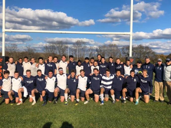 Yale Men team photo on a rugby field