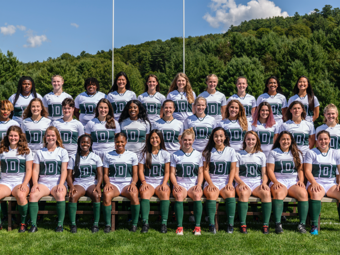 Dartmouth Women's rugby team posing on the field